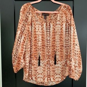Dana Buchanan Orange/Cream Animal Print Flouncy Blouse. Size Medium.